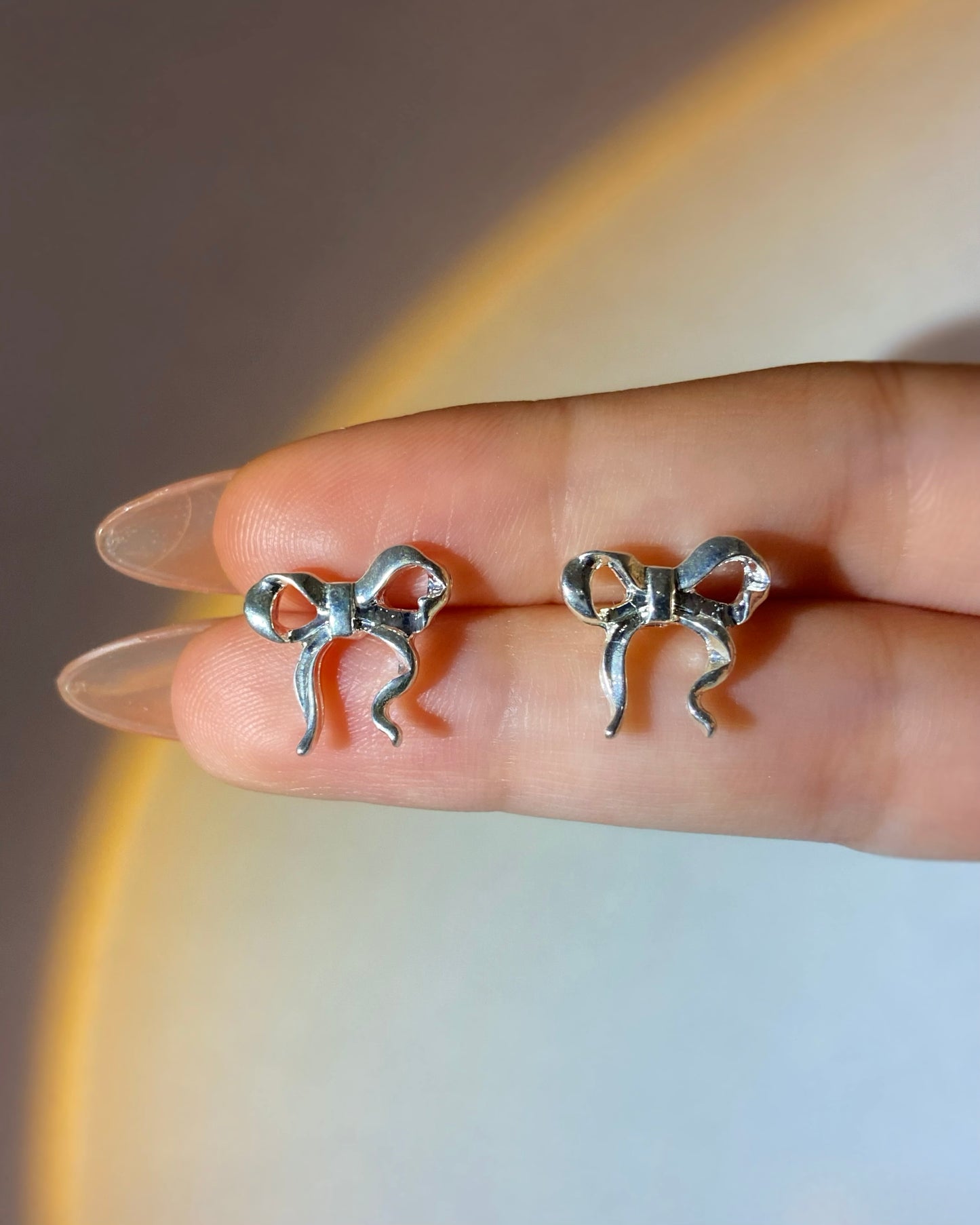 Coquette Silver Ribbon Stud Earrings | ☾129