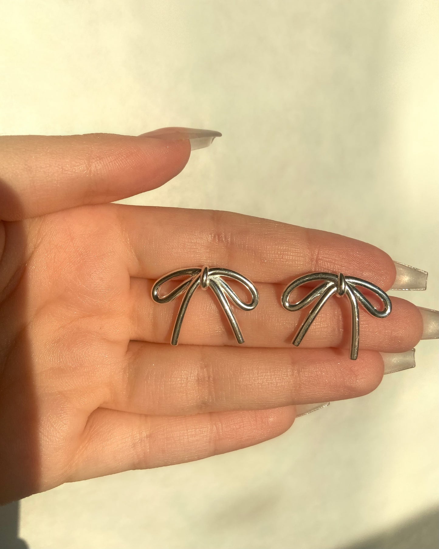 Silver Bow Ribbon Stud Earrings | ☾130